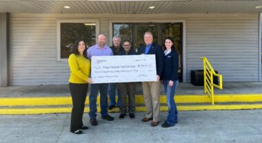 check presented to Weyerhaeuser team